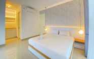 Bedroom 3 Minimalist and Deluxe 1BR at Pine Tree Resort Condominium By Travelio