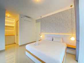 Bedroom 4 Minimalist and Deluxe 1BR at Pine Tree Resort Condominium By Travelio