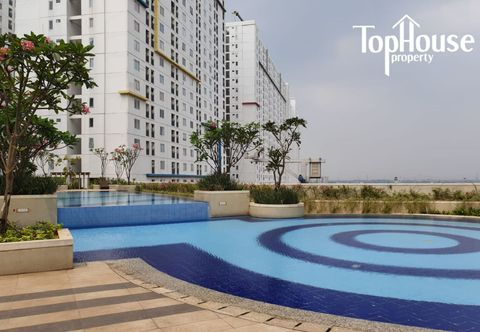 スイミングプール Apartment Bassura City by Travelibu