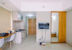 Khu vực công cộng 2 Elegant Wide View Studio at LRT City Jatibening Apartment By Travelio