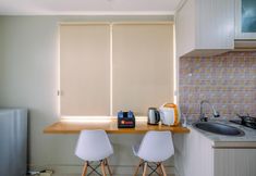 Khu vực công cộng 3 Elegant Wide View Studio at LRT City Jatibening Apartment By Travelio