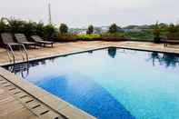 Swimming Pool Tidy and Comfy 1BR Apartment at Tree Park City BSD By Travelio