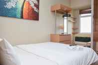 Ruang Umum Cozy and Simply Living Studio at Springlake Summarecon Bekasi Apartment By Travelio