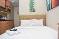 Bedroom Cozy and Simply Living Studio at Springlake Summarecon Bekasi Apartment By Travelio