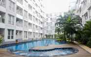 Swimming Pool 6 Comfortable Studio Room Apartment near Airport at Skylounge Tamansari  By Travelio