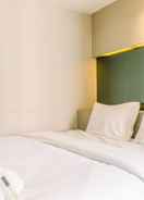 BEDROOM Elegant and Comfort 2BR at Green Bay Pluit Apartment By Travelio