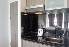 Common Space 3 Comfy and Exclusive Studio Room Apartment at Taman Melati Surabaya By Travelio