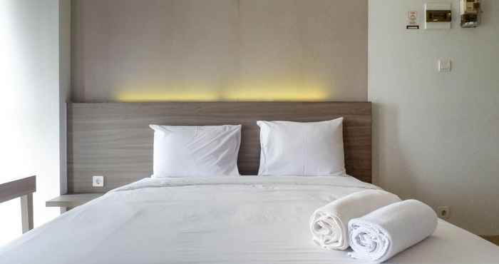 Bedroom Comfy and Exclusive Studio Room Apartment at Taman Melati Surabaya By Travelio
