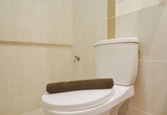 In-room Bathroom 6 Comfort 1BR Apartment with Working Room at Meikarta By Travelio