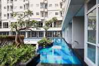 Swimming Pool Comfy and Minimalist Studio at Bintaro Icon Apartment By Travelio