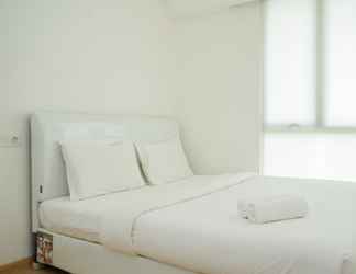 Bedroom 2 High Floor and Minimalist 2BR at Sky House BSD Apartment By Travelio