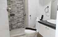 In-room Bathroom 5 Homey and Cozy Stay 2BR Vida View Apartment By Travelio