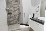 In-room Bathroom Homey and Cozy Stay 2BR Vida View Apartment By Travelio