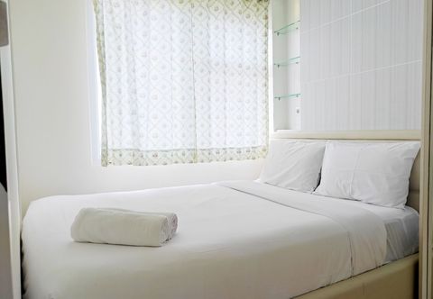 Bedroom Homey and Cozy Stay 2BR Vida View Apartment By Travelio