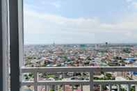 Sảnh chờ Homey and Cozy Stay 2BR Vida View Apartment By Travelio