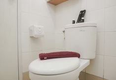 In-room Bathroom 5 Minimalist and Comfort Living 1BR at Bassura City Apartment By Travelio
