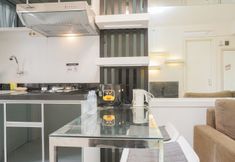 Common Space 3 Minimalist and Comfort Living 1BR at Bassura City Apartment By Travelio