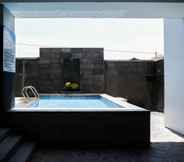 Swimming Pool 7 Best Price 2BR Strategic Apartment at Puri Mas By Travelio