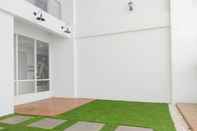 Exterior Homey and Comfy 2BR at Patraland Urbano Apartment By Travelio