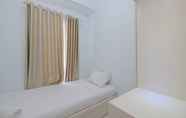 Bedroom 2 Homey and Comfy 2BR at Patraland Urbano Apartment By Travelio