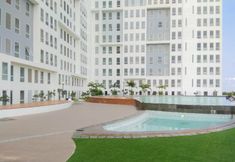 Swimming Pool 7 Homey and Comfy 2BR at Patraland Urbano Apartment By Travelio