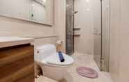 In-room Bathroom 5 Minimalist 1BR Apartment with Study Room at Marigold Nava Park By Travelio