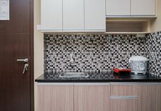 Ruang Umum 4 Homey and Comfort 1BR at Saveria BSD City Apartment By Travelio