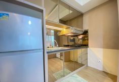 Bedroom 2 Spacious Studio Room at Apartment Tamansari La Grande near BIP By Travelio