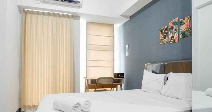 Bedroom Minimalist Studio Connected to Pakuwon Mall at Supermall Mansion Apartment By Travelio