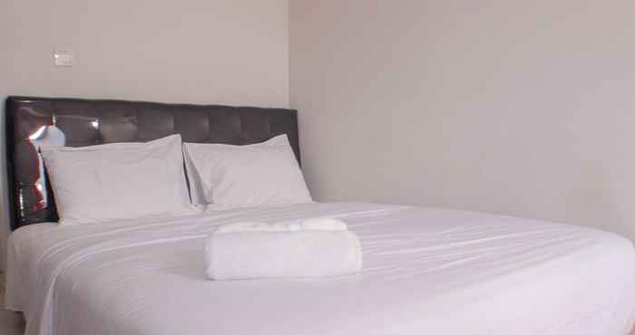 Bedroom Cozy and Modern Studio at Springlake Summarecon Bekasi Apartment By Travelio