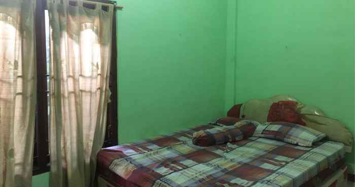 Bilik Tidur Queen Kost Madiun