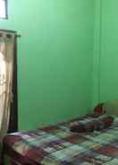 BEDROOM Queen Kost Madiun