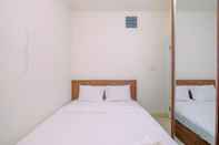 Bedroom Simply and Homey 2BR at Green Pramuka City Apartment By Travelio