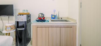 Bedroom 2 Homey and Simply Studio Meikarta Apartment By Travelio