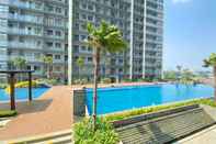 Swimming Pool New and Nice 2BR at Daan Mogot City Apartment By Travelio