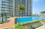 Swimming Pool 7 New and Nice 2BR at Daan Mogot City Apartment By Travelio