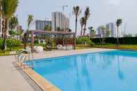 Swimming Pool Comfortable Design 2BR Apartment Sky House BSD By Travelio