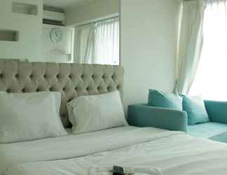 Bedroom 2 Tidy and Elegant Studio at Grand Kamala Lagoon Apartment By Travelio