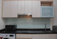 Common Space 4 Fully Furnished with Comfortable Design Studio Apartment at Menteng Park By Travelio