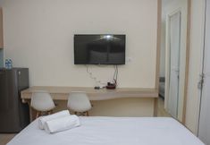 Common Space 2 Fully Furnished with Comfortable Design Studio Apartment at Menteng Park By Travelio