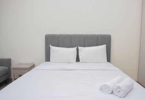 Bedroom Fully Furnished with Comfortable Design Studio Apartment at Menteng Park By Travelio