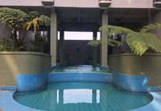 Swimming Pool 7 Bohemian Beauty Studio Room Apartment at Grand Asia Afrika By Travelio