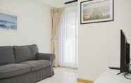Ruang Umum 3 Comfort 2BR at M-Town Residence Apartment By Travelio