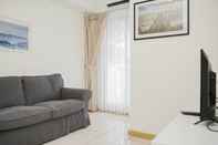 Ruang Umum Comfort 2BR at M-Town Residence Apartment By Travelio