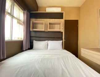 Bedroom 2 Well Furnished 2BR Apartment at Suites @Metro By Travelio