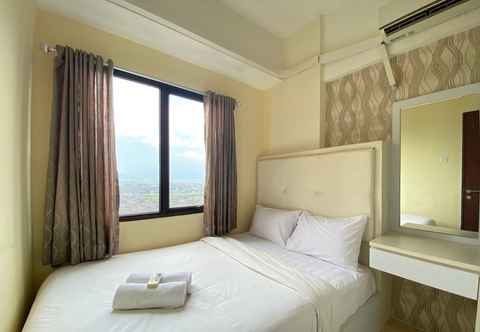Bedroom Bright 2BR Apartment at Tamansari Panoramic By Travelio