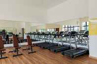 Fitness Center Fully Furnished with Modern Design 2BR Apartment at Sky House BSD By Travelio