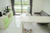 Common Space Fully Furnished with Modern Design 2BR Apartment at Sky House BSD By Travelio