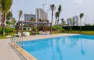 Swimming Pool 7 Fully Furnished with Modern Design 2BR Apartment at Sky House BSD By Travelio