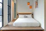 Kamar Tidur U Stay Hotel Style Batik